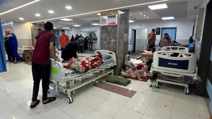 Medics and patients pictured at Al Shifa Hospital in Gaza City on November 10, 2023.